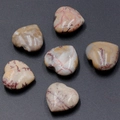 Polished natural moss agate heart stones in beige with unique reddish-brown textures - Red Grass Stone