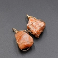 Handmade gold wire-wrapped orange natural raw crystal pendants set of two pieces - Sunstone