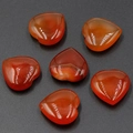 Set of six heart-shaped red agate stones with smooth polished finish and natural texture - Red Agate