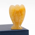 Orange natural crystal angel figurine handcrafted from polished stone with wings - Topaz