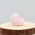 Pink rose quartz carved duckling figurine on a natural wooden base for home decor - Rose Quartz