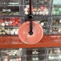 Pink translucent crystal donut pendant with dark braided rope cord necklace - Watermelon Red (Synthetic)
