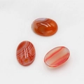 Polished 18x25mm oval banded agate cabochons with natural orange and white stripes - Red Agate