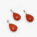 Faceted red jasper waterdrop pendant necklaces with silver bails on white fabric - Red Jasper