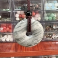 Natural gray marble donut pendant necklace with dark red braided cord and black bead - Picasso Stone