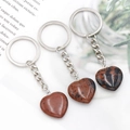 Natural heart-shaped red jasper stone keychain set with polished gemstone pendants - Mahogany Obsidian