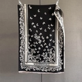 Detail of French retro scarf showing elegant butterfly jacquard patterns and soft fabric - 186*70cm / Black