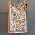 Close-up of cashmere-feel scarf with vintage flower bird print and orange edge - Gray