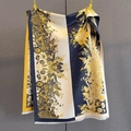 Detail of sunflower jacquard pattern on navy and yellow cashmere feel scarf with tassels - Blue Beige Yellow