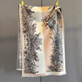 Close-up of vintage floral print scarf with elegant fringe details and color blocking - Light Brown Beige