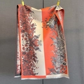 Detail of vintage floral pattern on orange and beige scarf with fine white fringes - Beige Orange
