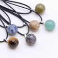 Set of six assorted 14mm natural crystal sphere pendants with black woven cords - Random (Single)