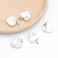 White howlite heart pendant with natural grey marble veins and polished silver clasp - Howlite
