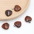 20mm heart-shaped mahogany obsidian crystal pendants with metal clasp in a wooden tray - Mahogany Obsidian