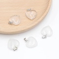 Five heart-shaped natural crystal and agate pendants in clear and milky white finishes - White Crystal