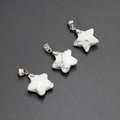 Star-shaped white turquoise stone pendants with silver clasps on a grey background - Howlite (Single Bead)