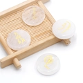 Piedras curativas Reiki con símbolos kanji dorados para meditación y feng shui natural - Cristal de roca