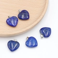 Five heart-shaped natural lapis lazuli pendants with silver-colored bails and gold flecks - Lapis Lazuli