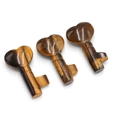 Three heart-shaped tiger eye stone key pendants with golden brown cat eye texture - Tiger's Eye