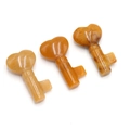 Polished natural yellow jade heart key pendants with organic mineral stone textures - Topaz