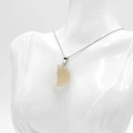 Necklace with light yellow translucent crescent moon stone pendant on a silver metal chain - Natural Agate