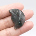 Handcarved bloodstone crescent moon face pendant with green and red natural stone texture - African Blood Stone