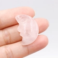 Hand-carved pink rose quartz crescent moon face pendant with natural crystal texture - Rose Quartz