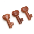 Red brown goldstone heart-shaped key carvings with sparkling crystalline finish - Gold Sandstone