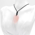 Polished natural rose quartz heart-shaped pendant necklace on female mannequin - Rose Quartz