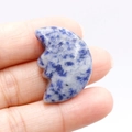 Sodalite blue stone pendant featuring a hand-carved double-sided crescent moon face - Blue Spot Jasper