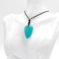 Heart-shaped turquoise stone pendant with natural veins on a black braided cord necklace - Blue Turquoise (Synthetic)