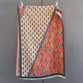 Close-up of paisley pattern knit scarf with fringe details in orange and beige - 190*65cm / Orange (GSJ-559)