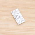 Rectangular white turquoise stone pendant with grey marble veins and top-drilled hole - Howlite