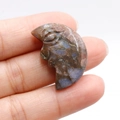 Hand carved natural moon crystal pendant with face profile in brown and lilac stone - Blue Flash Stone
