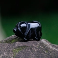 Polished black obsidian hand-carved mini pig animal figurine with a high-gloss finish - Obsidian