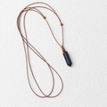 Blue goldstone hexagonal pointed crystal pendant on adjustable brown cord necklace - Blue Sandstone (Synthetic)