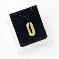 Pendentif ovale en pierre naturelle jaune sur cordon noir dans son coffret - Topaze