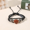 Multilayer leather bracelet featuring a round brownish goldstone gem and woven cord - Goldstone (Synthetic)