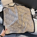 Detail of paisley print silk scarf with black border on plush rug with luxury accessories - 68*68cm / Beige Gold Black Edge (FW-136)