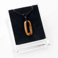 Pendentif anneau en œil de tigre aux reflets dorés avec cordon noir minimaliste - Œil de tigre