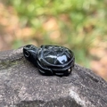 Polished black obsidian turtle figurine hand-carved from natural gemstone for decor - Obsidian
