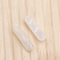 Par de pinzas para el cabello rectangulares de acetato jaspeado crema sobre madera - Cristal de roca