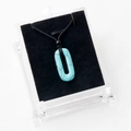 Pendentif turquoise ovale avec texture marbrée naturelle sur cordon noir en coffret - Turquoise bleue (Synthétique)