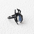 Punk spider ring with black metal finish and blue-white cat eye stone inlay for Halloween - Opal (Synthetic) / Antique Silver