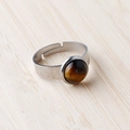 Adjustable silver stainless steel ring featuring a round tiger eye natural gemstone - Tiger's Eye