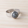 Adjustable silver stainless steel ring featuring a round 11mm blue agate stone inlay - Larvikite