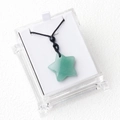 Star-shaped green aventurine quartz crystal pendant on black cord in gift display box - Green Aventurine