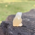 Mini natural yellow agate bird carving on rock base with translucent polished finish - Natural Agate
