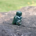 Miniature hand-carved dark green crystal dinosaur statue made of natural agate stone - India Agate