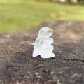 Miniature clear crystal dinosaur figurine carved from natural translucent white quartz stone - White Crystal